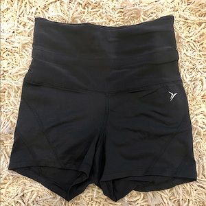 Athletic/yoga shorts. Top supports tummy or can be rolled down (see pic). S/XS.